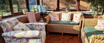 Sofas in oasis conservatory