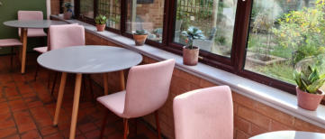 tables and chairs in conservatory